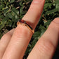 10k Oval Half-Bezel Garnet Ring